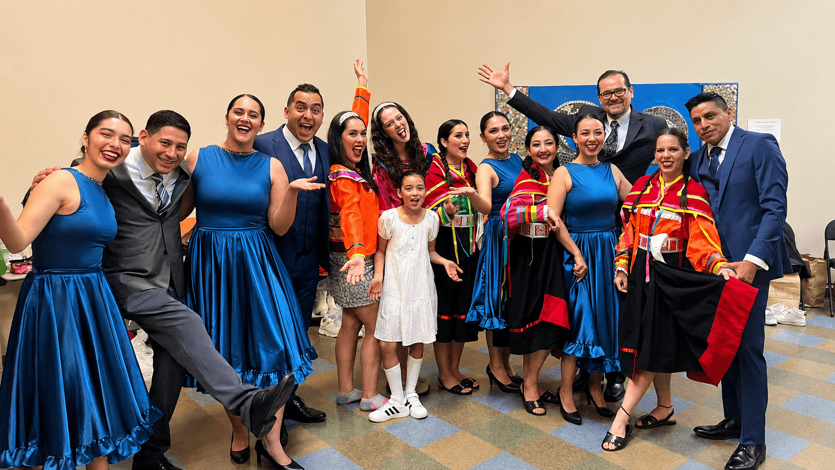 Peru Baila dancers and community members celebrating after a cultural performance