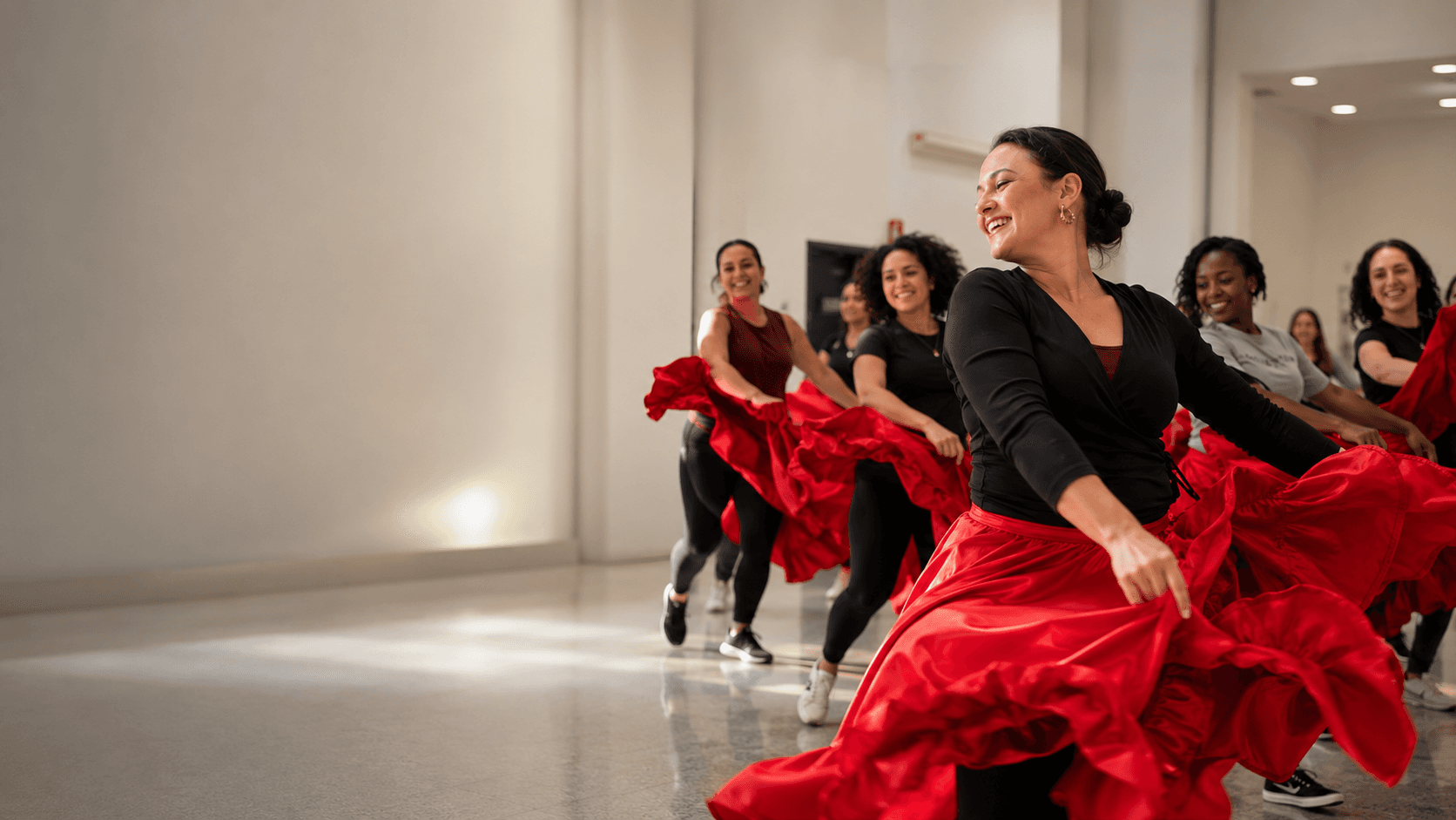 Peru Baila dancers following an instructor in a red-skirt class