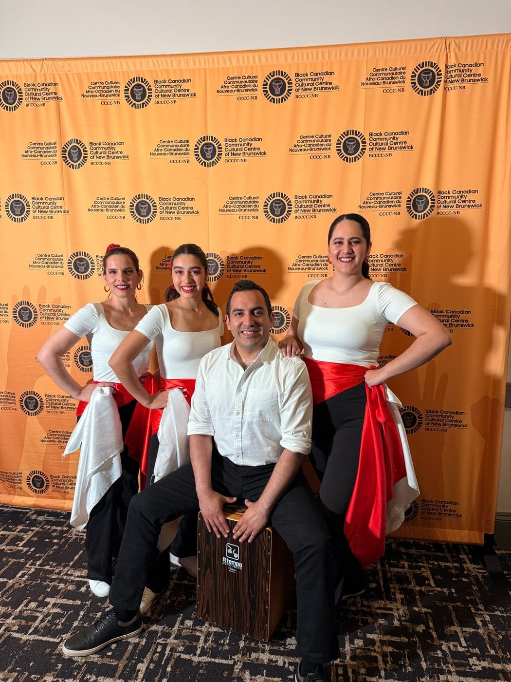Peru Baila dancers posing together after a performance