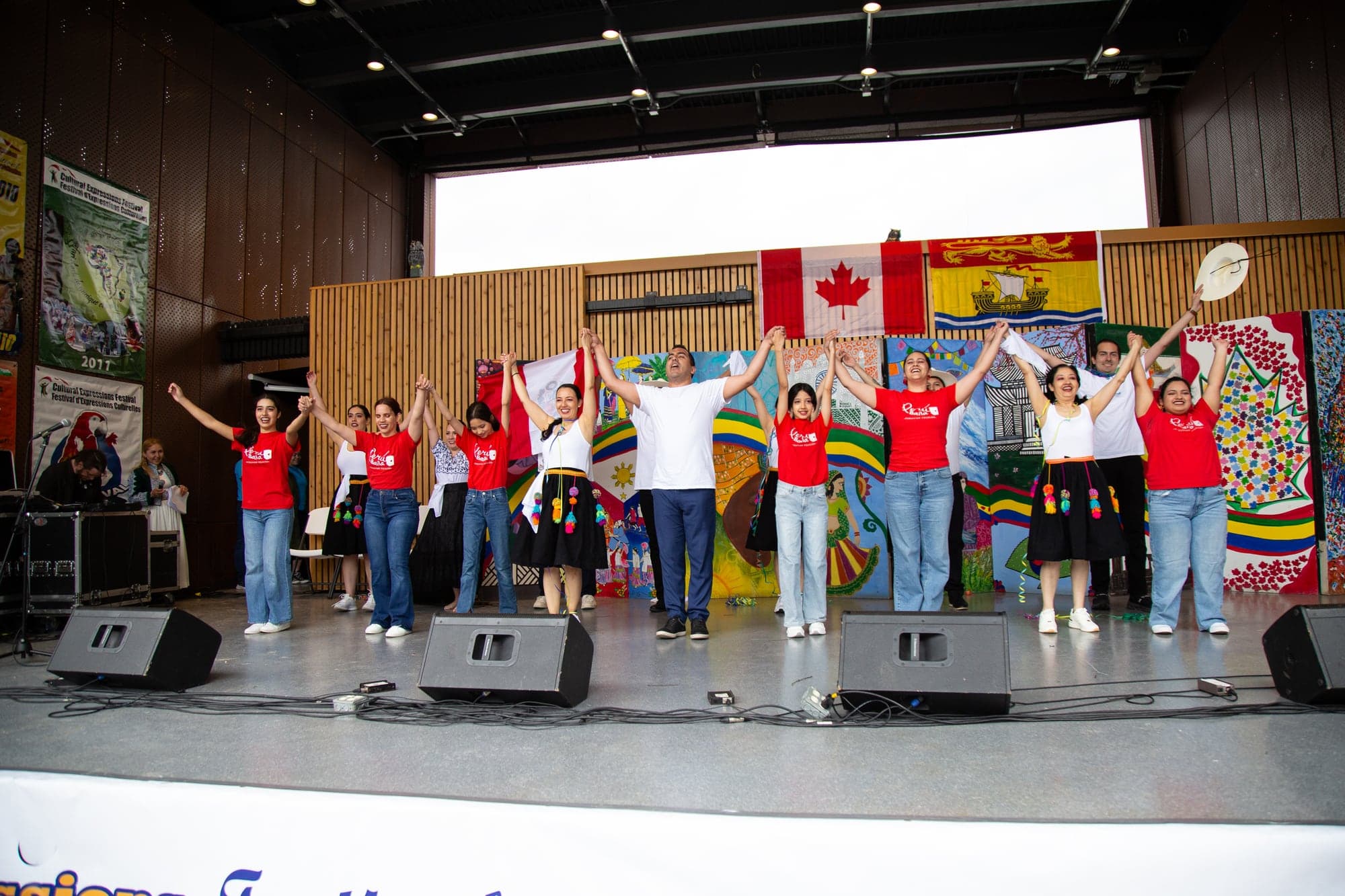 Peru Baila performers sharing a cultural presentation on stage