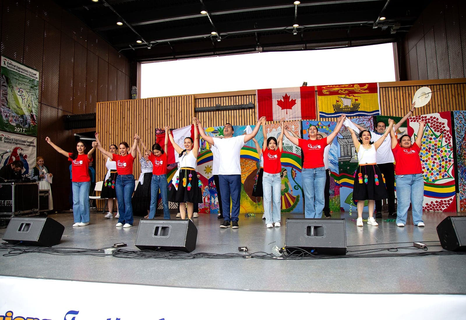 Peru Baila community presentation with performers on stage