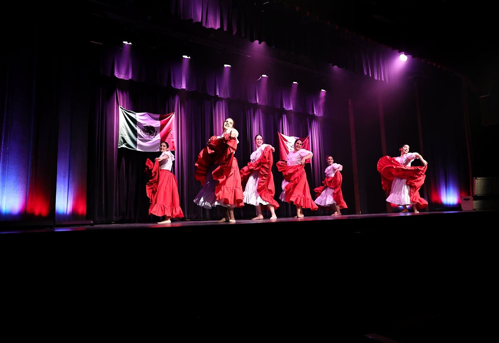 Peru Baila performers sharing Peruvian dance on stage