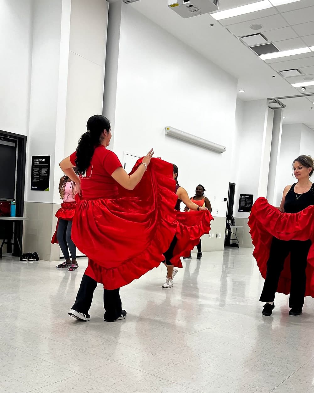 Peru Baila dancer practicing graceful skirt technique