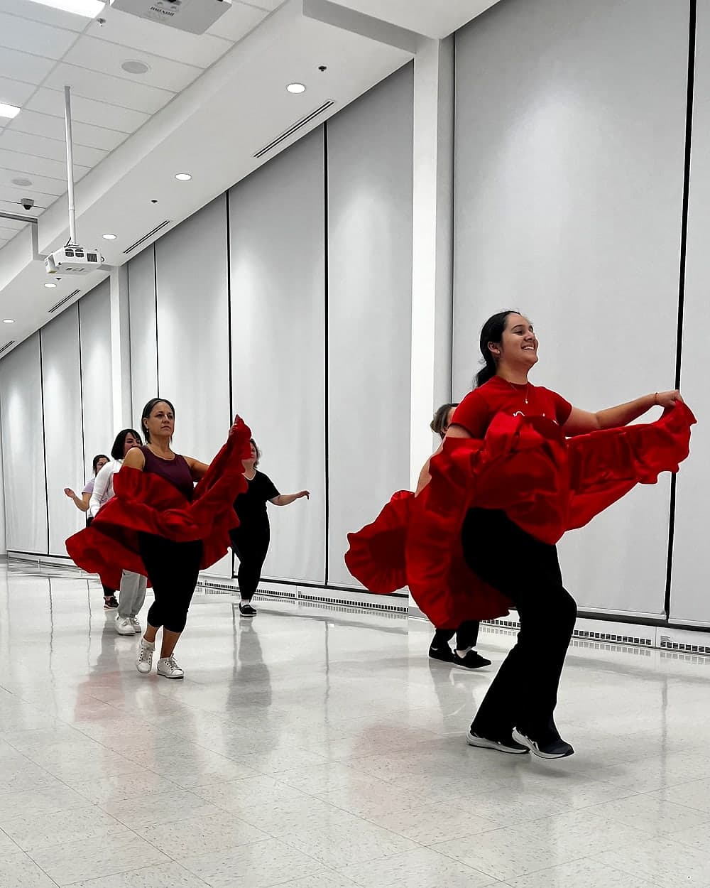 Peru Baila dancer practicing expressive skirt movement